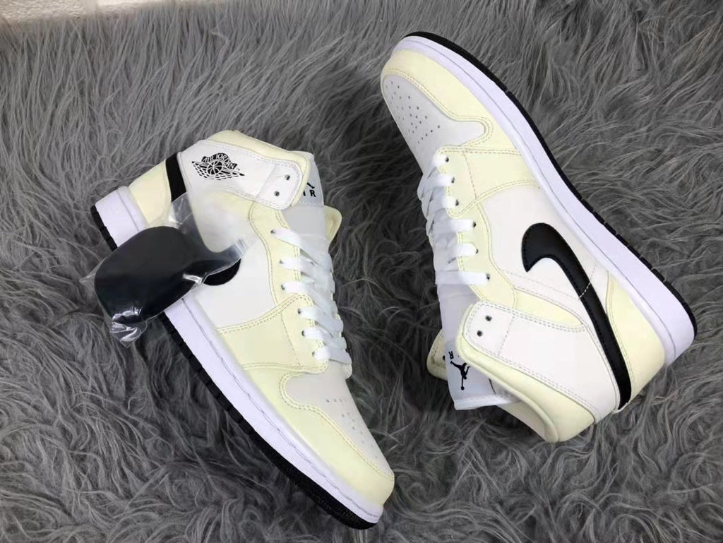 Jordan Air 1 Mid Sneakers Cream White and Black