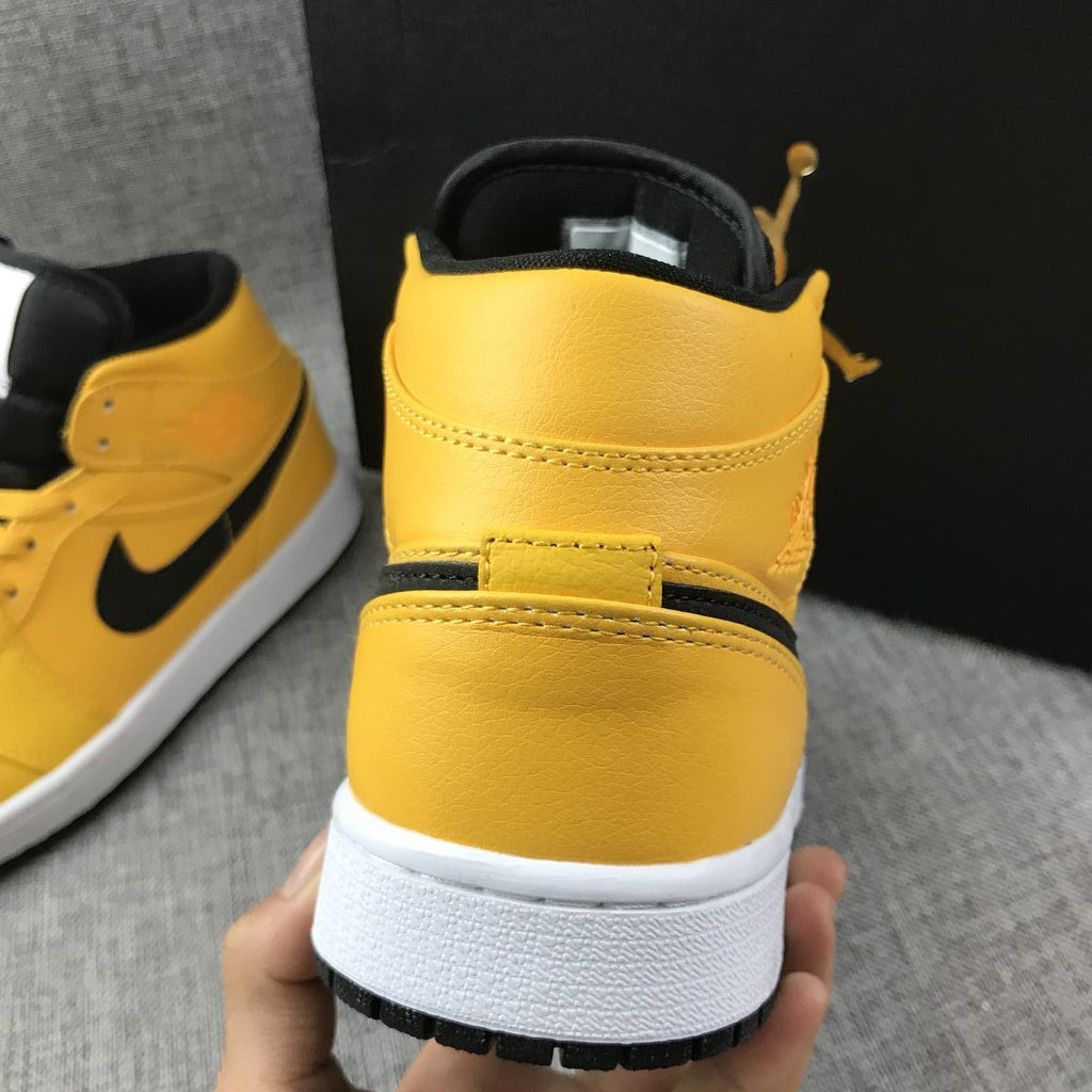 Air Jordan 1 Mid University Gold Black White Sneakers