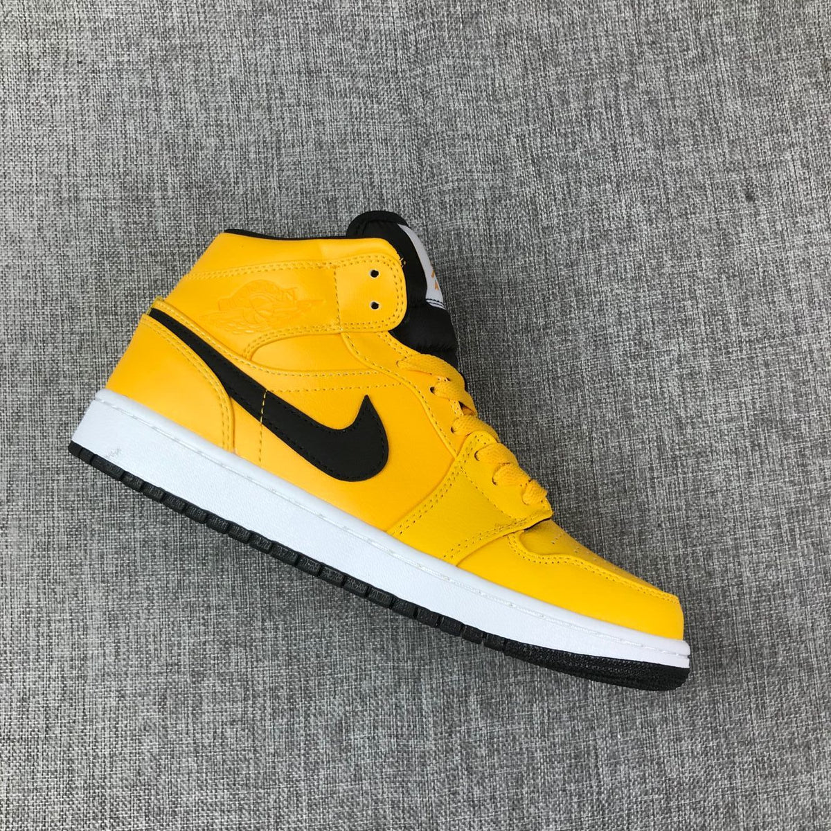 Air Jordan 1 Mid University Gold Black White Sneakers