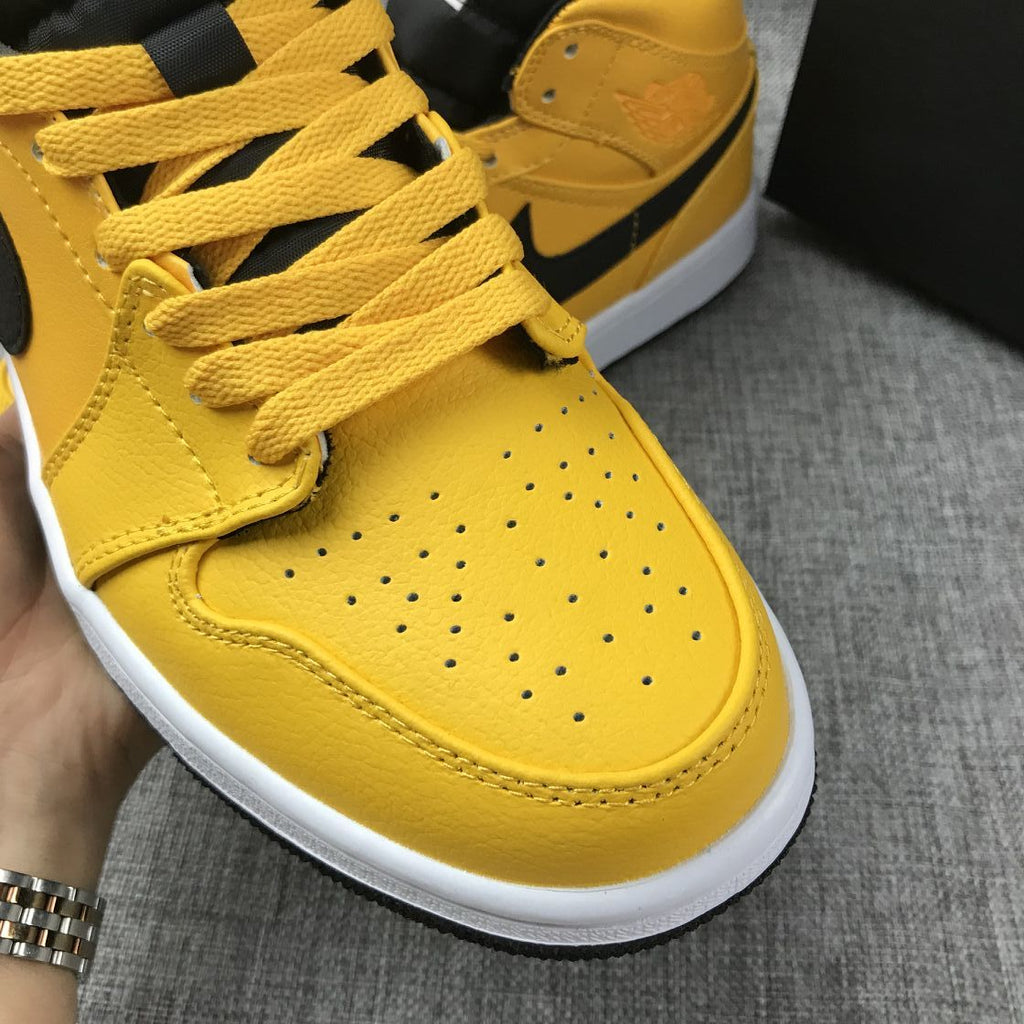 Air Jordan 1 Mid University Gold Black White Sneakers
