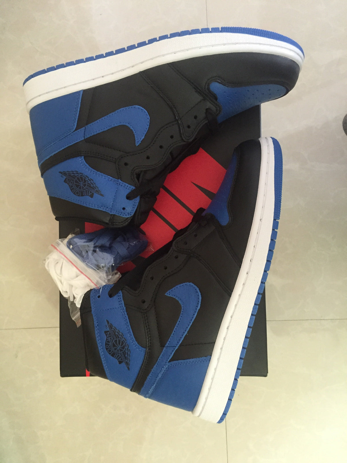Jordan 1 High Black and Royal Blue Sneakers