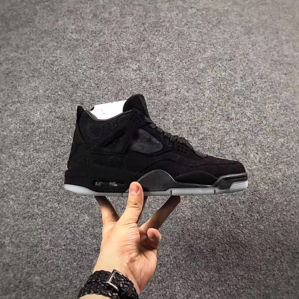 Jordan 4 KAWS Graffiti Black High-Top Sneakers