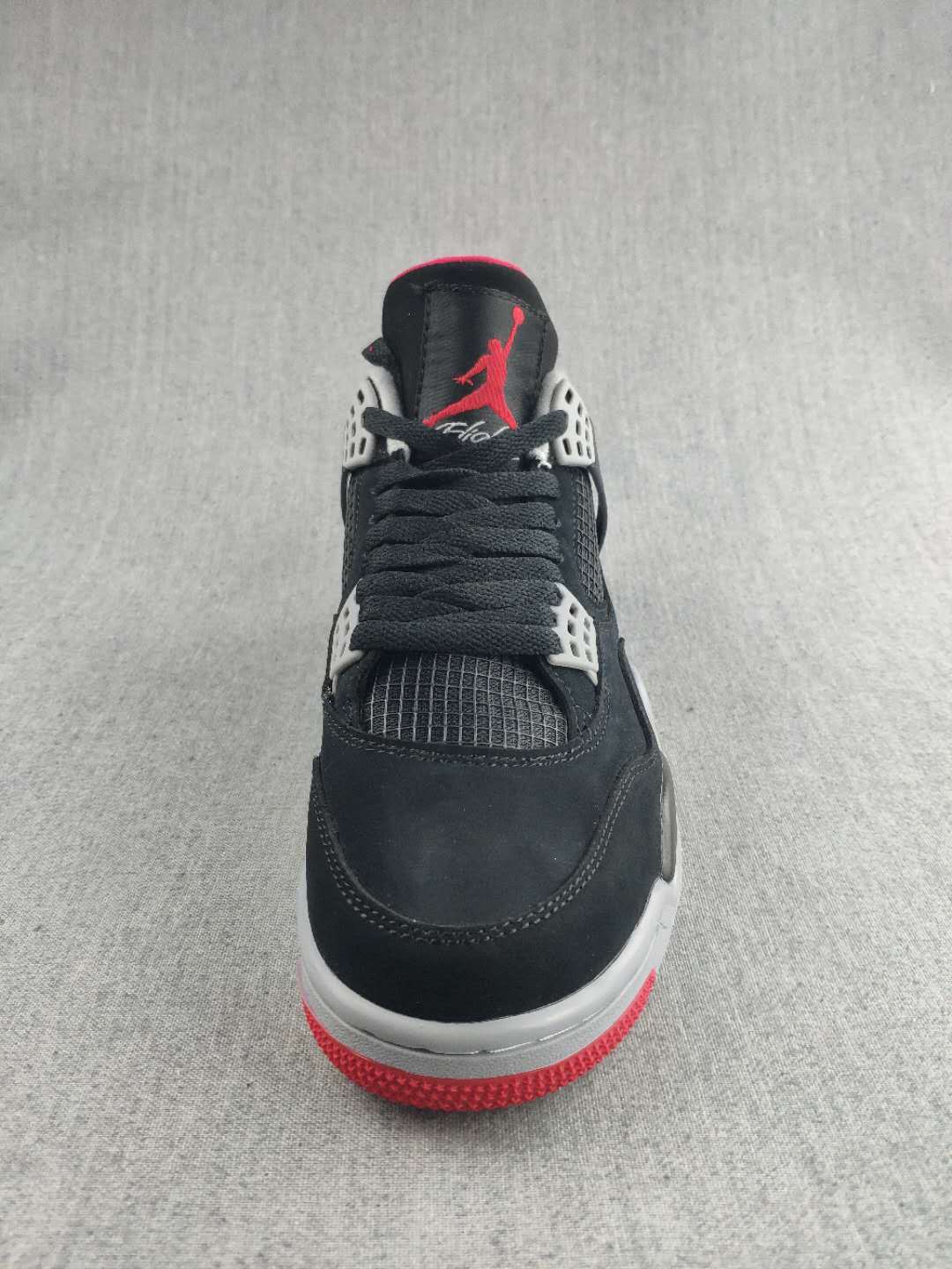 Jordan 4 Retro Sneaker in Black, Red and White
