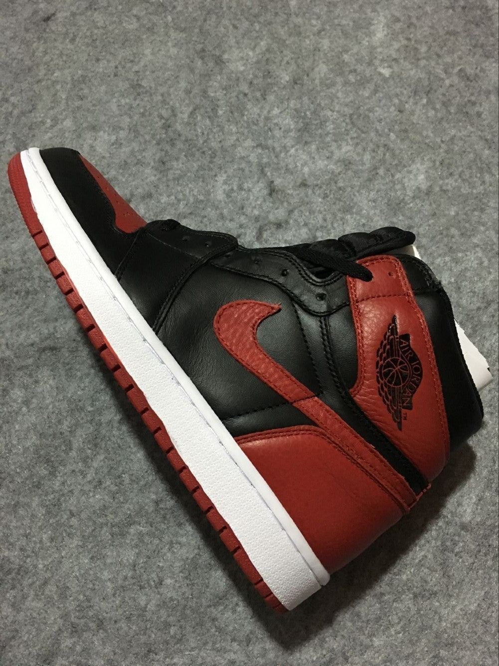 Air Jordan 1 High Black and Red Sneakers