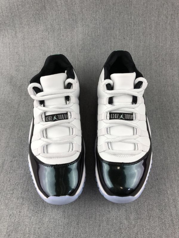 Jordan 11 Low Sneakers in White and Black