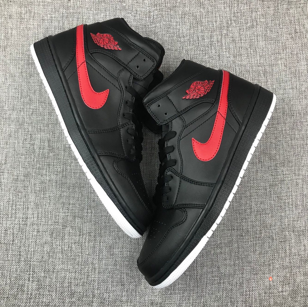Air Jordan 1 Mid Black and Red Sneakers 554724-045