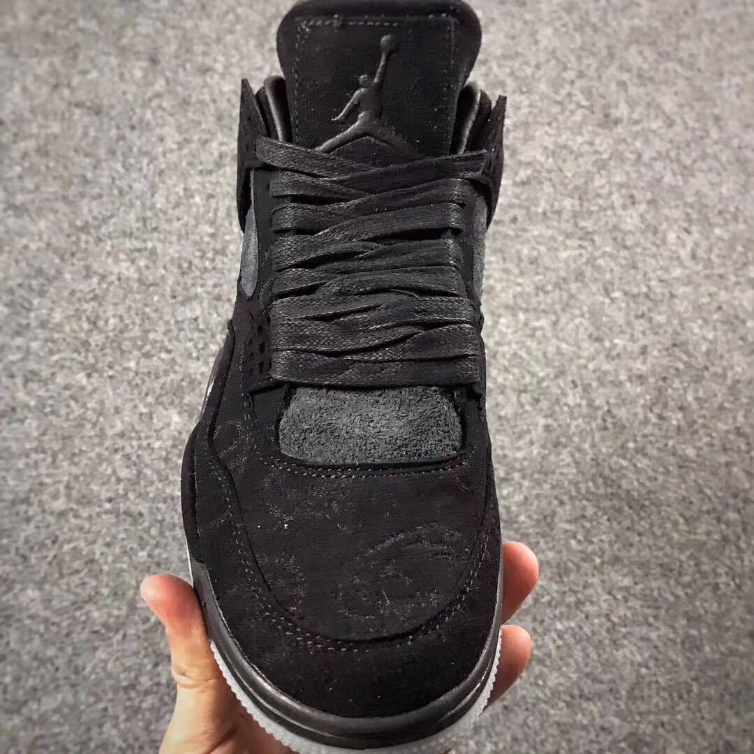 Jordan 4 KAWS Graffiti Black High-Top Sneakers