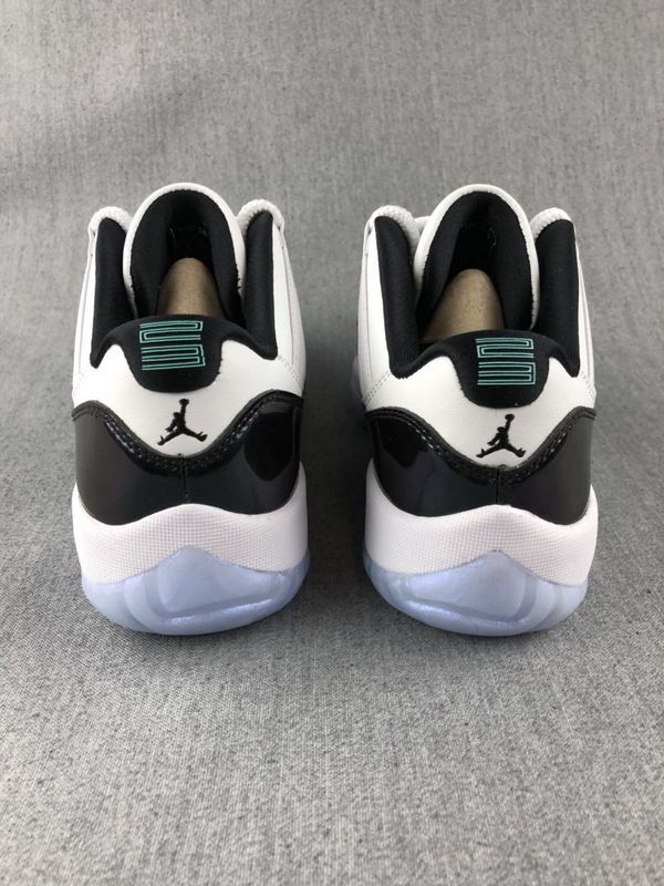 Jordan 11 Low Sneakers in White and Black