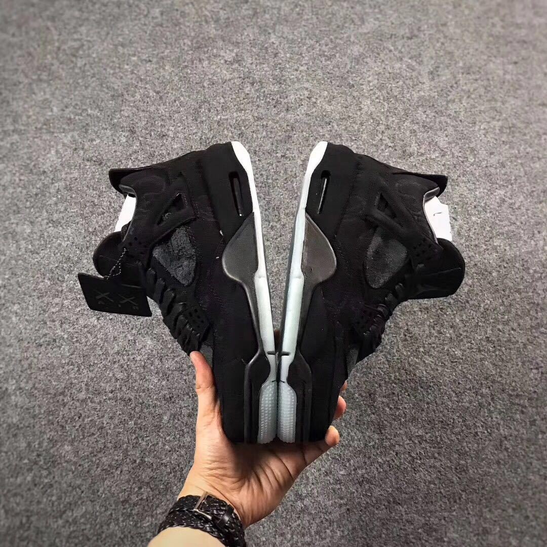 Jordan 4 KAWS Graffiti Black High-Top Sneakers