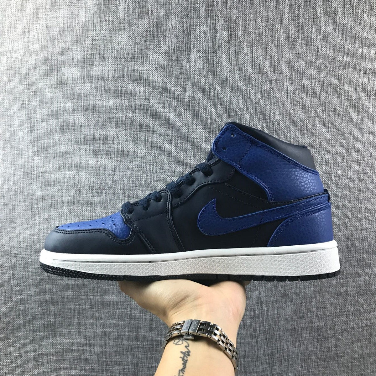 Air Jordan 1 Mid Black and Royal Blue High-Top Sneakers