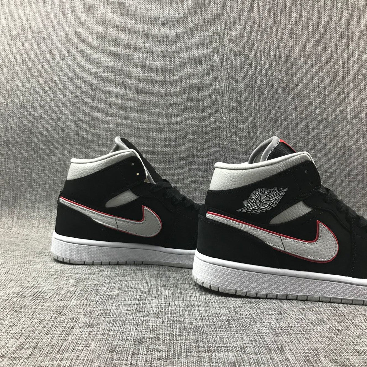 Air Jordan 1 Mid Black, White & Red Sneakers 554724-060